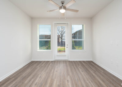 view of living room with patio access in a residence at The View at NoDA apartments in Athens Georgia