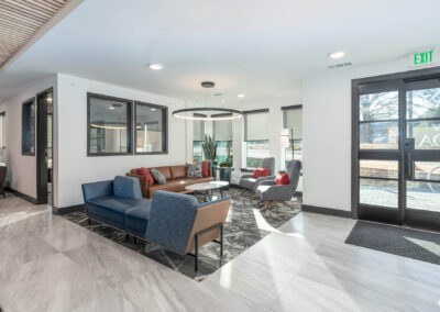 Interior lobby view of the leasing center at The View at NoDA apartments in Athens Georgia
